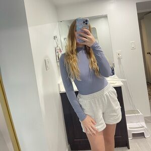 Skims mock neck long-sleeve top in a periwinkle size medium